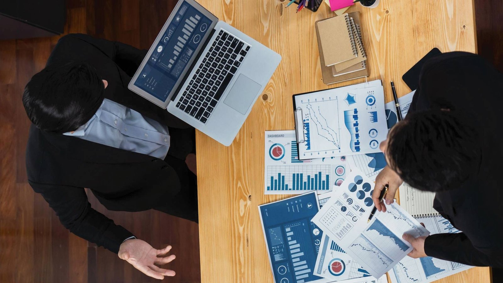 Brennan Investment Group reviews market data for new acquisitions.