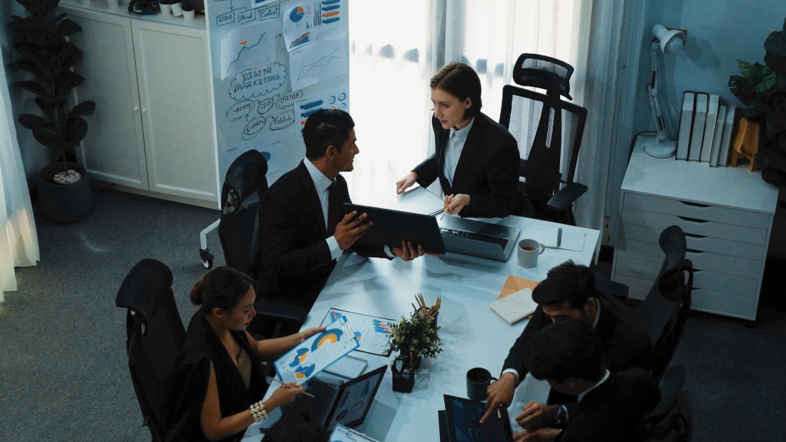 Zillow professionals collaborating on property market insights.