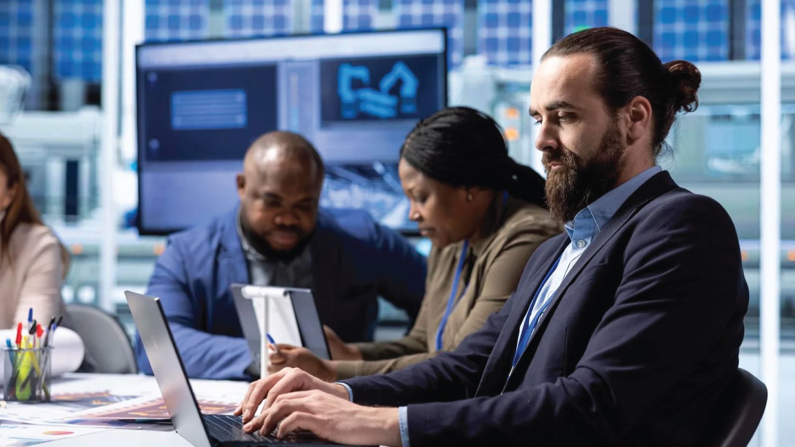 Teleste team working on network solutions.