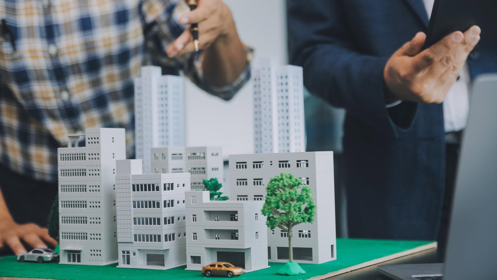 Amenta Emma architects reviewing multifamily housing plans in Boston.