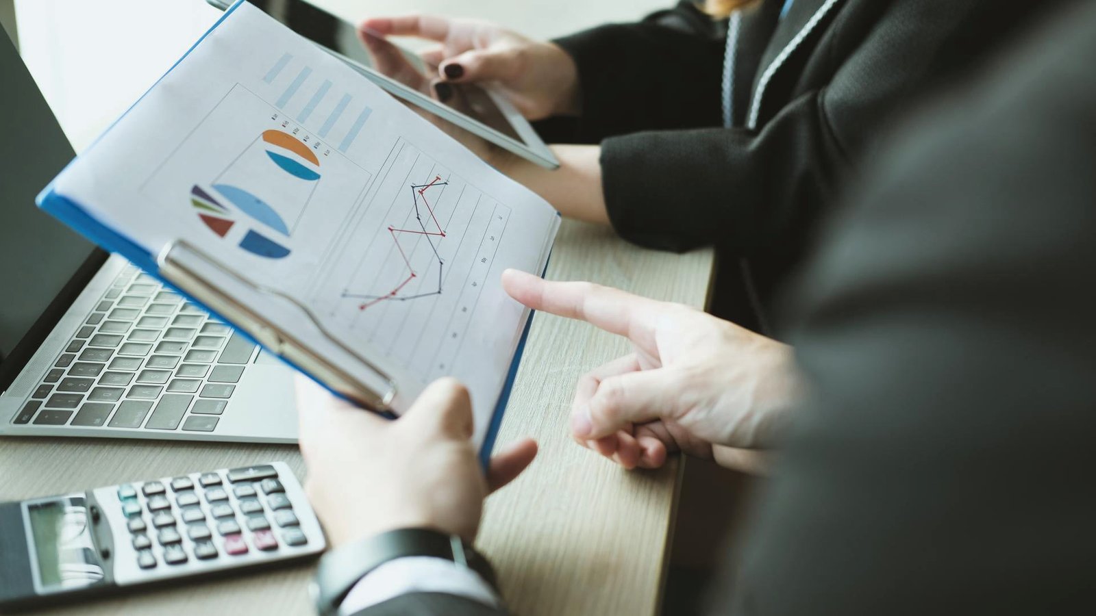 Lovett Industrial team meeting to evaluate international industrial investment opportunities.