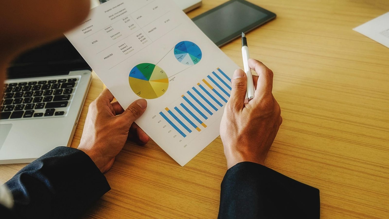 EQT Real Estate team reviewing logistics investment performance and market data.