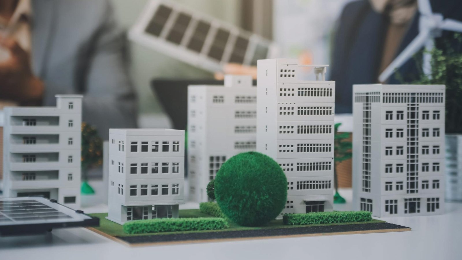 Primaris showcases scale model of mixed-use development featuring residential buildings and green spaces.